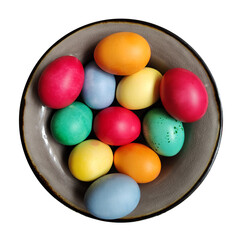 Merry dyed multicolored Easter eggs lying on a plate. Spring seasonal religious symbol of resurrection and renewal. Orthodox Christian tradition. Ethnic folk custom.