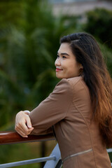 Vietnamese woman in the park during lunchtime in Vietnam. 
