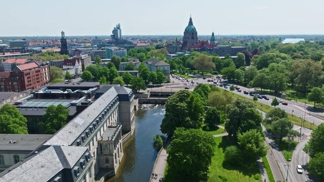 Drone shot of Leine river , Hannover city centre on a sunny day , Germany . - Powered by Adobe