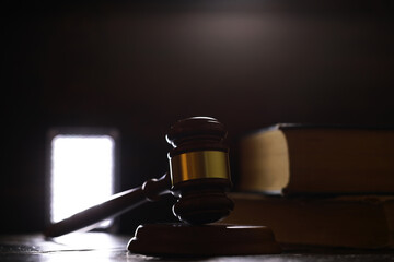 Judges gavel on wooden desk. Law firm concept.