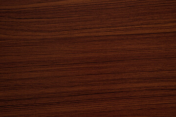 Reddish brown wood grain background.