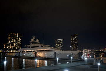 Fototapeta premium night view of white cruise ship parked at the port, docklands Melbourne