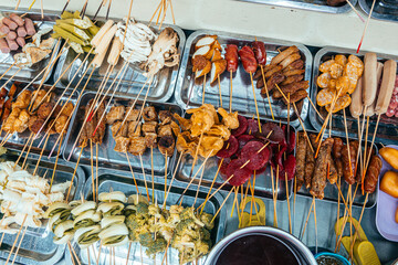 different kind of food is displayed at market stall