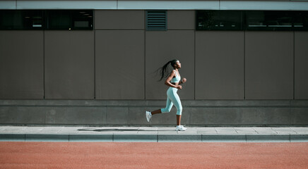 Black woman, running and city sport on sidewalk with training, exercise and fitness on road. Street, urban runner and female athlete with mockup and body workout for health, wellness and race outdoor - obrazy, fototapety, plakaty