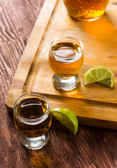 tequila in shot glasses with lime and salt