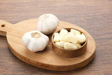 Fresh garlic (bawang putih) on a wooden table
