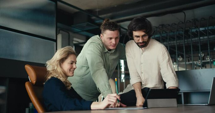 Dynamic Office Team: Brunette Guys, Blonde Woman, Laughter, and Success