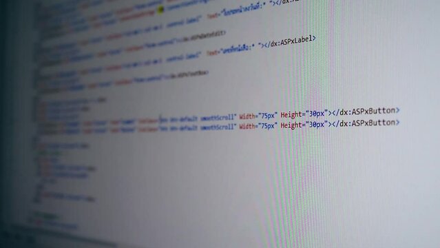 Web, application and software development. Programming code on a monitor.