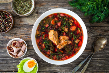 Borsch - beetroots soup on wooden table
