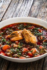 Borsch - beetroots soup on wooden table
