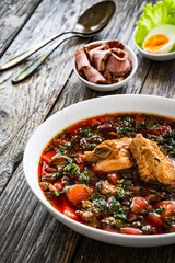 Borsch - beetroots soup on wooden table
