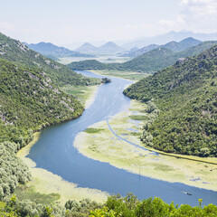 Fototapeta na wymiar Green and blue view to Lake Skadar
