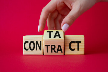 Contact and Contract symbol. Businessman hand points at turned wooden cubes with words Contract and Contact. Beautiful red background. Contact and Contract and business concept. Copy space