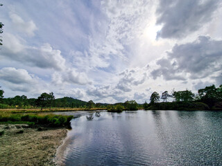 Countryside views over a lake and country woodland