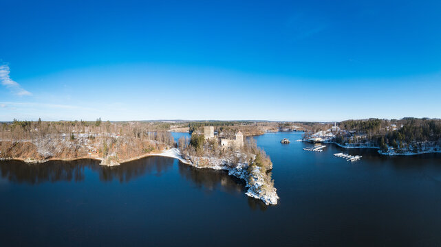 Snow covered Lichtenfels ruin in Waldviertel region. Beautiful famous landmark at lake Ottenstein in Waldviertel, Lower Austria. Aerial view during winter.