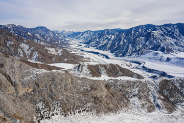 Fototapeta na wymiar Altai mountains in winter: Aigulak Ridge, Say-Sugat Place. Aerial view.