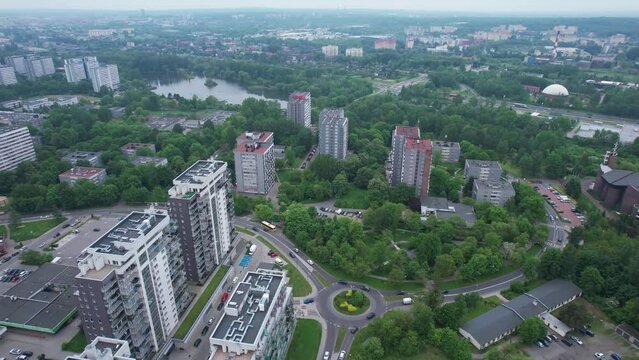 Residential area overlooking the lake. Polish city of Katowice. Multi-storey buildings from above.