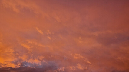 View of clouds in a orange red sunset 