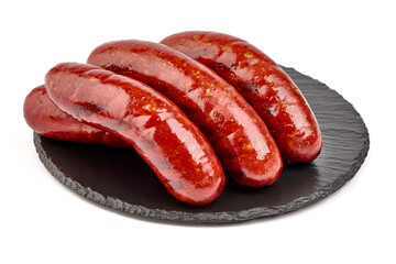 German grilled pork sausages with tomato sauce, close-up, isolated on white background.