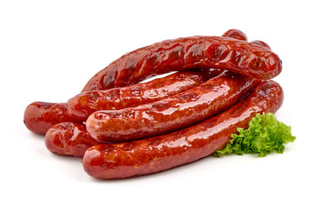 German grilled pork sausages with tomato sauce, close-up, isolated on white background.