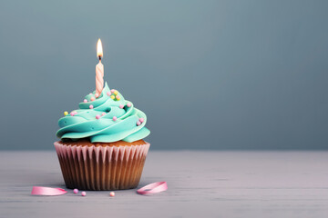 A cupcake with blue frosting and a lit candle background generative ai 