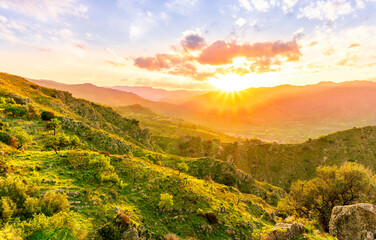 Fototapeta na wymiar green highland mountain landscape of beutiful sunset or sunrise in greeen summer rural land