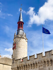 Fototapeta na wymiar Clock tower of the Hotel de Ville, the city hall of La Rochelle, France