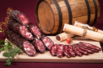 Still life with meat products, vegetables, interior items and entourage in the background.