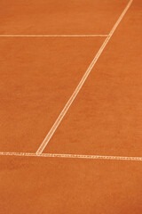 tennis court made of red clay soil with markings for game or competition. sports and recreation, professional performance champions in lawn tennis with rackets and balls. training of athletes outdoor