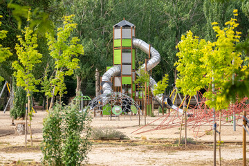 Fototapeta na wymiar Playground for children to enjoy at Casa de Campo in Madrid.