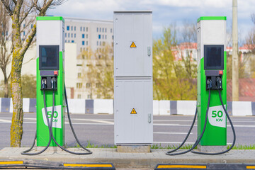Green electric charging stations with grey power transformation station