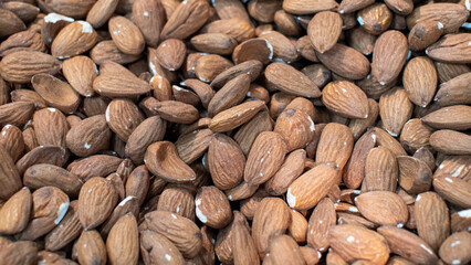 peeled almonds in the market close up for background