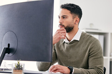 Thinking, planning and business man on computer for website solution, research and serious, focus or job decision. Reading, review and choice of web designer person on desktop pc for problem solving