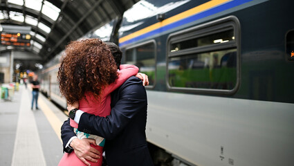 Beautiful couple hugging after long separation
