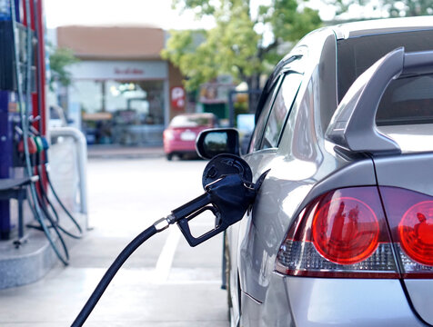 Car refueling service is in progress.