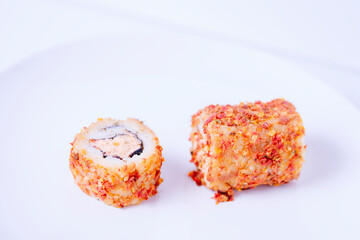 Sushi with different red species on the outside.