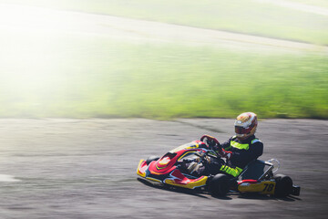 panning of a fast pass of a racing go kart