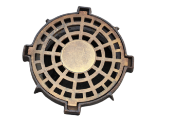Cast iron storm sewer manhole on a white isolated background. Manhole cover for a sewer well. Wastewater disposal.