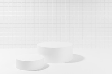 Elegant white abstract stage mockup with two cylinder podiums in hard light, shadow, template for presentation cosmetic products, spa, goods, tiny mosaic tile in simple minimal beauty style.