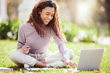 Woman sitting on lawn, laptop and college student on campus, studying with course material and education. Happy female person outdoor, learning and study online notes on pc with academic scholarship