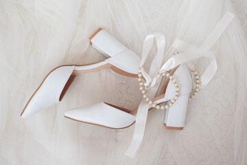 Wedding white shoes of the bride. Wedding accessories