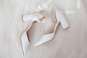 Wedding white shoes of the bride. Wedding accessories