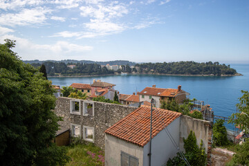 Fototapeta na wymiar panorama view of the old town of Rovinj, Croatia with red roofs and clear blue sea and a clear blue sky