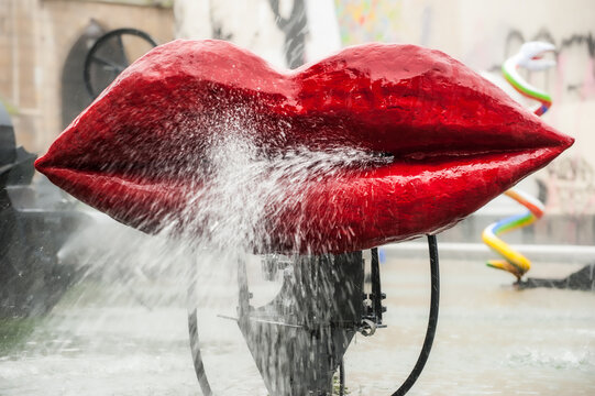 Stravinsky Fountain, sculpture art installation in the water, square near Centre Pompidou.Red lips and kiss.Love concept.