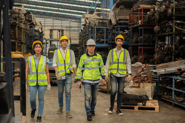 Team engineering, worker standing at warehouse auto parts. industry factory car automobile. Teamwork technician work successful, connection partnership successful concept.