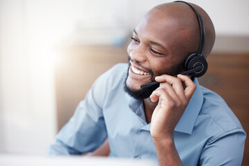 Call center, black man and happy agent working on computer in the office, business in telemarketing...