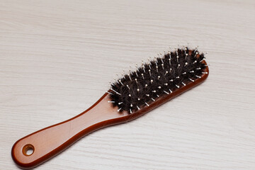 Hair loss on the wooden comb, hair loss problem.