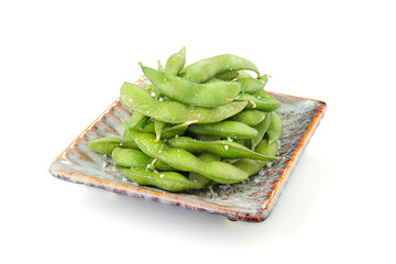 Japanese edamame on a plate isolated on white background