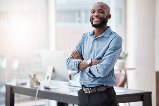 Black man in business, arms crossed and smile in portrait with confidence, mockup space and professional mindset. Career mission, ambition and empowered happy male employee in corporate workplace