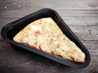 Pizza with cheese on box Italian food